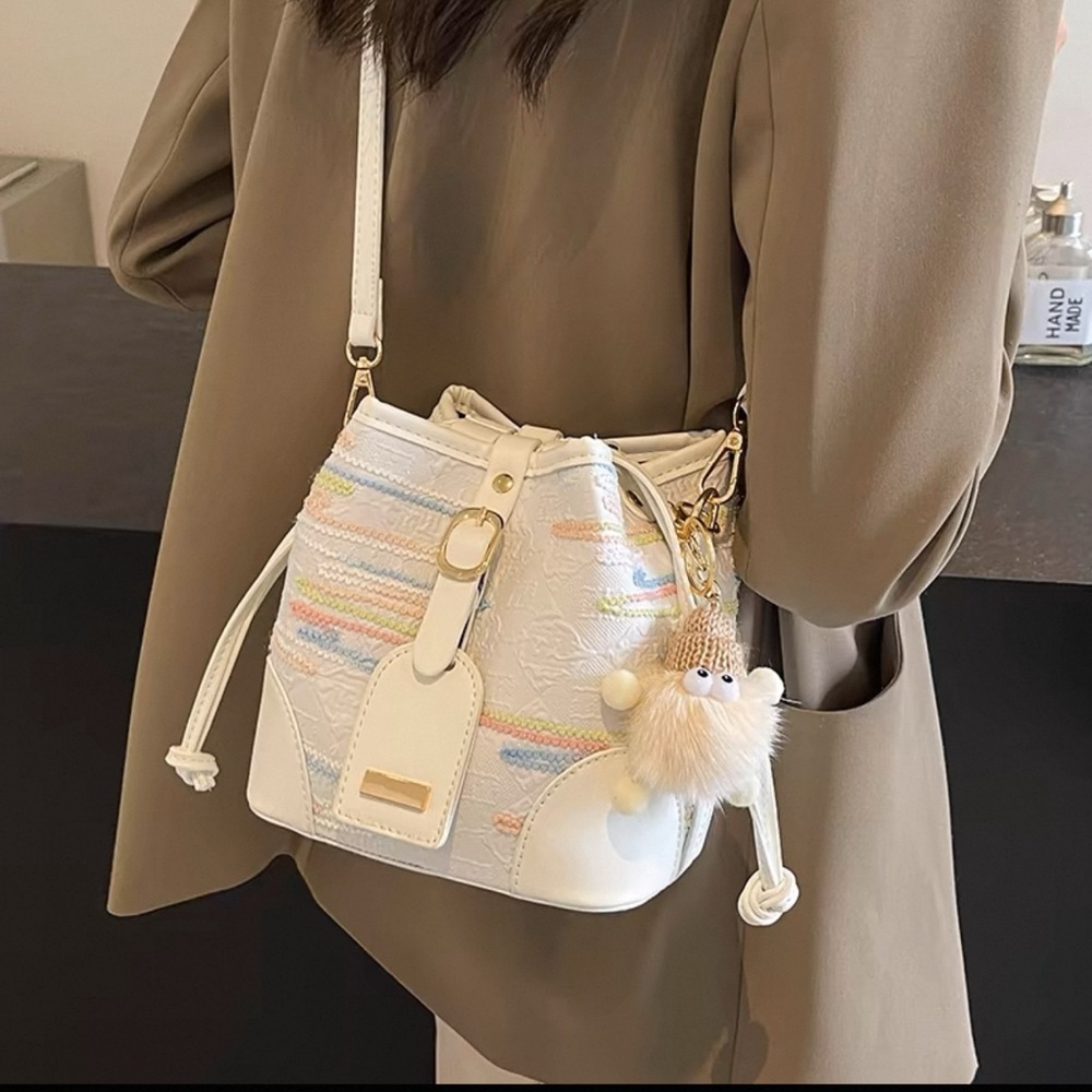 Elegant White Bucket Bag with Pastel Accents